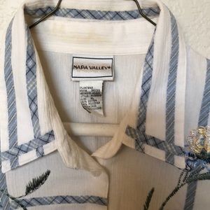 White women blouse with flowers down the front